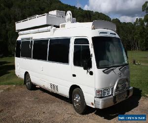 Toyota Coaster Motorhome with all the creature comforts.