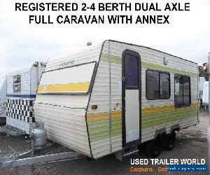 REGISTERED 2-4 BERTH DUAL AXLE FULL CARAVAN WITH ANNEX. ISLAND BED