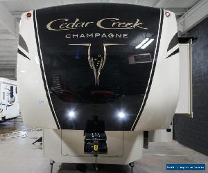 2017 Forest River Cedar Creek Champagne 38ERK Camper