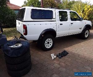 NISSAN NAVARA 4X4 DUAL CAB Also selling separately CAMPER TRAILER ROOF TOP TENT.