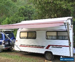 Scenic Rear Entry pop top 15' caravan with Awning.