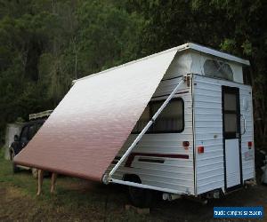 Scenic Rear Entry pop top 15' caravan with Awning.