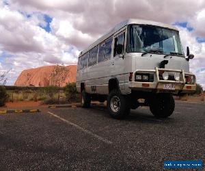 Toyota Coaster 4WD Bus with professional 4x4 conversion