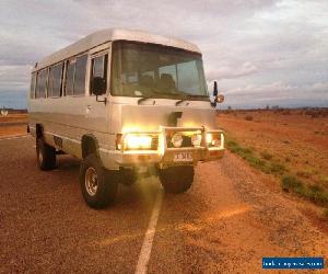 Toyota Coaster 4WD Bus with professional 4x4 conversion