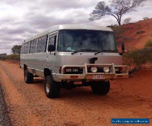 Toyota Coaster 4WD Bus with professional 4x4 conversion