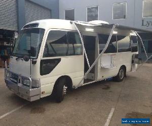 Toyota Coaster Motorhome and Moped