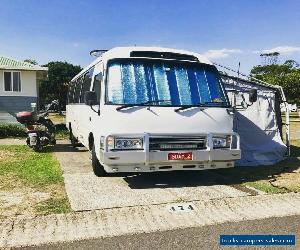 Toyota Coaster Motorhome and Moped