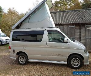 Mazda Bongo  2004 2lt petrol with new side camper conversion. ELECTRIC lift roof