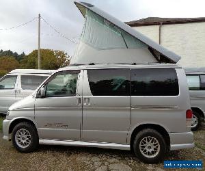 Mazda Bongo  2004 2lt petrol with new side camper conversion. ELECTRIC lift roof