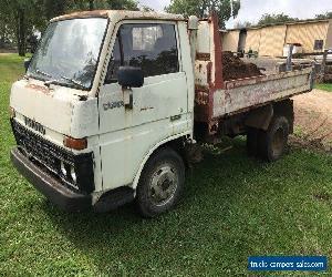 TIPPER FARM TRUCK ,DIESEL , WORKS WELL ,A ROUGHY BUT HANDY.