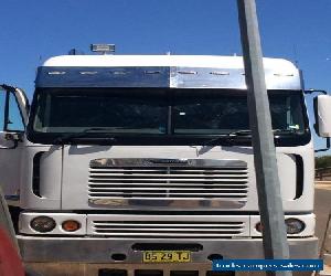 freightliner argosy tipper and dog