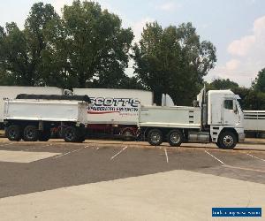 freightliner argosy tipper and dog