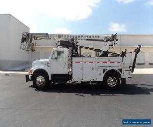 2001 International 4700 CABLE PLACER BUCKET BOOM TRUCK