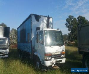 Mitsubishi 2000 6x2 FM600 curtain sider Truck. 22500kg GVM Tail gate lifter.