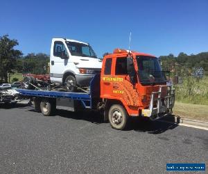 ISUZU TILT SLIDE TOW TRUCK 9.5 GVM 5.6 METRES REGISTERED AND ROADWORTHY