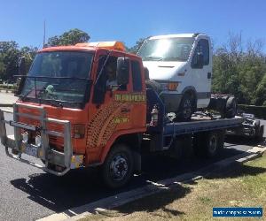 ISUZU TILT SLIDE TOW TRUCK 9.5 GVM 5.6 METRES REGISTERED AND ROADWORTHY