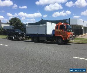 ISUZU TILT SLIDE TOW TRUCK 9.5 GVM 5.6 METRES REGISTERED AND ROADWORTHY