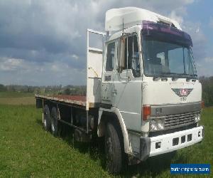 Hino 1990 FS Super dolphin 6x4 Boggey drive tray top truck..