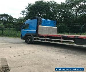 Volvo 26 tonnes flatbed with Moffett 