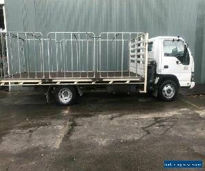 2007 Isuzu NPR 400 Table top truck with cage