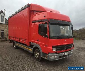 Mercedes-Benz Atego  818 sleeper cab  20fr curtainsider with tail-lift