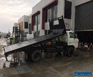 Tow Trucks  -  (4 $13,999Club Rego / RWC )    Full hydraulic tilting tray 