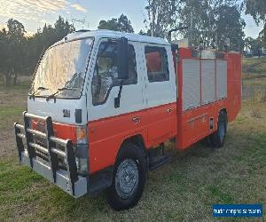 Mazda B4600 dual cab fire truck. Workshop service body truck as new low km.