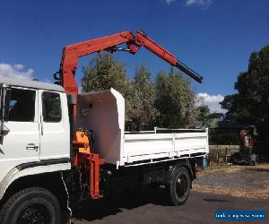 Hino GT173 tip truck, 1.6t crane, drop down sides, 1984 104,000kms, high/low 4WD