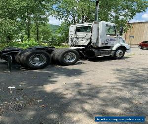 1999 Volvo VNM64T