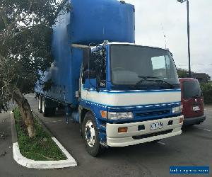 HINO GH 2001 TAULINER WITH MAZZENINE FLOOR for Sale