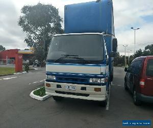 HINO GH 2001 TAULINER WITH MAZZENINE FLOOR