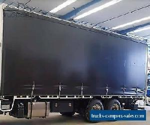 TAUTLINER CURTAINSIDER - WITH ROLLERS AND BUCKLES