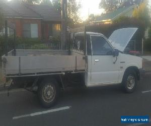 Ford Courier 1995 tray back 2.4 petrol Pendle Hill SYD cheap rego 4/2020