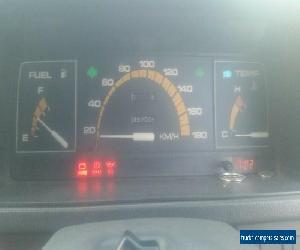 Ford Courier 1995 tray back 2.4 petrol Pendle Hill SYD cheap rego 4/2020