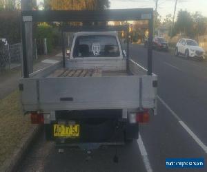 Ford Courier 1995 tray back 2.4 petrol  SYD  rego 4/2020 NO RERSERVE AUCTION 