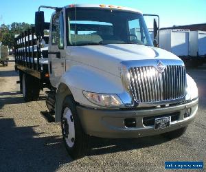 2006 International 4200 NON CDL LONG RACK LIFT GATE JUST 9K ACTUAL MI ADJUSTABLE LOAD ANGLE LIFT GATE